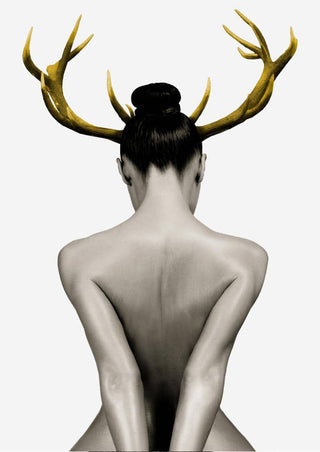 Artistic poster of a nude woman from behind with golden antlers on her head against a plain background.
