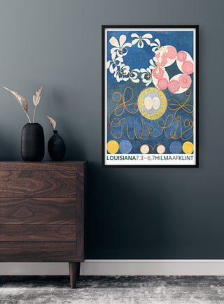 Framed "Hilma af Klint - Abstract Flowers" poster with floral designs, displayed on a dark wall above a dresser.