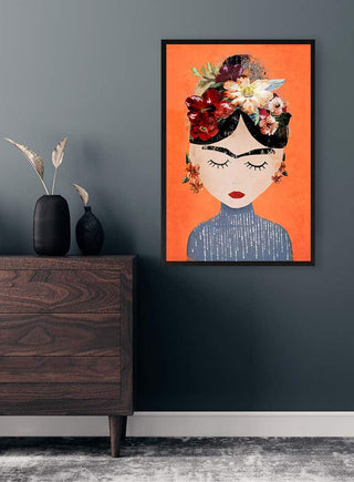 Framed Orange Mexican - Treechild artwork featuring a woman with floral headpiece, displayed above a modern dresser.