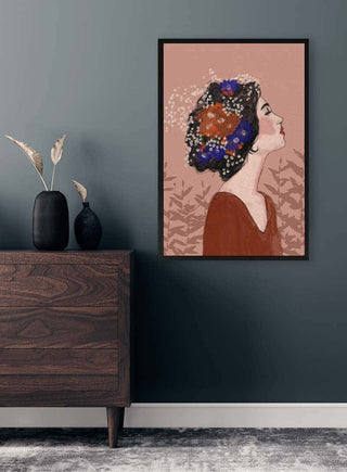 Framed "Summer Night - Treechild" artwork of a woman with floral hair, displayed above a wooden dresser.