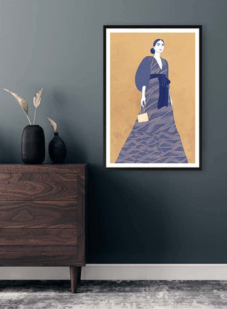 Framed "Soul Of Freedom - Elara Monet" artwork featuring a woman in blue dress, displayed above a dark wood dresser.