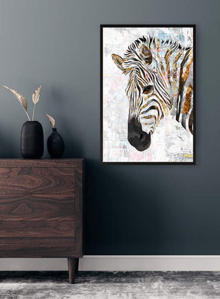 Framed Grunge gold zebra artwork hanging above a dark wooden dresser in a modern, minimalist room.
