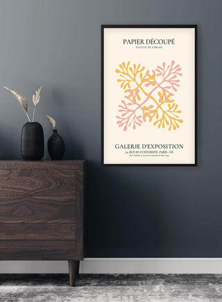 Framed Colorful Papier Decoupe Flower Plakat on a dark wall above a wooden dresser with decorative vases.