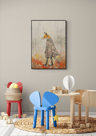 Framed Fox In a Poncho art print displayed on a playroom wall above children’s furniture and toys.