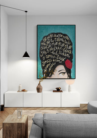 Large framed Rehab - Nour Tohme artwork on wall above white cabinet in modern living room.