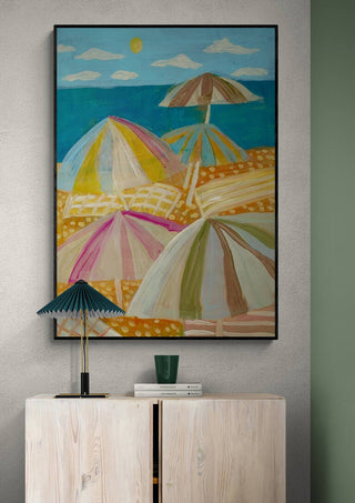 Framed "Vamos ala Beach" by Eleanor Baker featuring colorful beach umbrellas by the sea.