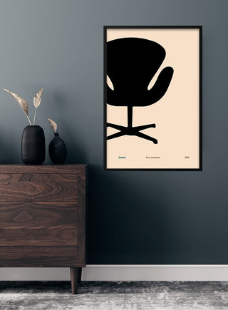 Minimalist poster of Arne Jacobsen's Swan chair on a beige background, styled above a dark wood dresser in a living room.