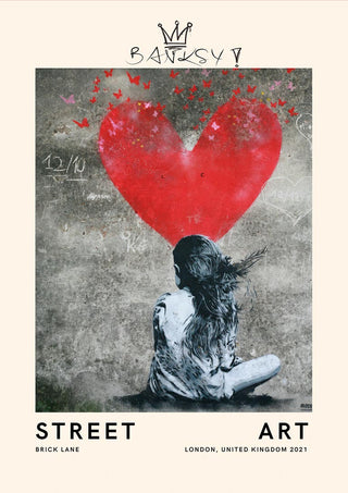 Poster inspired by Banksy featuring a girl with a red heart-shaped graffiti and butterflies on a grey wall.