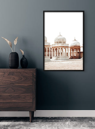 Framed Old Marketplace Naturposter with domed architecture hanging on a dark wall above a wooden dresser.