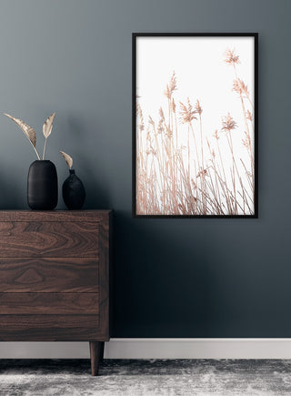 Abstract Reeds Naturposter in a black frame displayed above a dark wood dresser in a modern room.