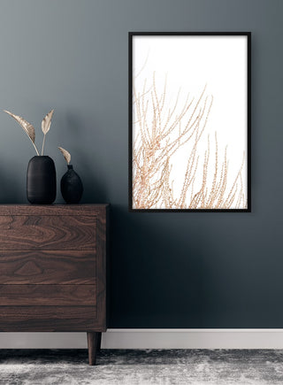 Framed Abstract Reeds No. 4 Plakat artwork on a dark wall above a wooden dresser with vases and dried reeds.