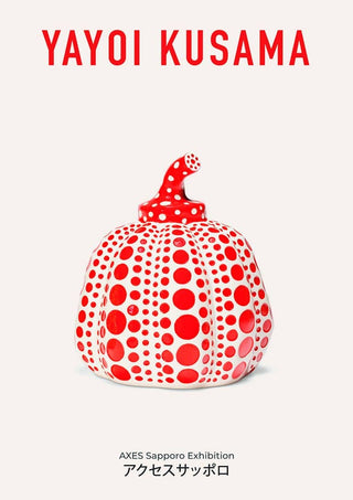 Red pumpkin sculpture with white and red polka dots by Yayoi Kusama on a white background.
