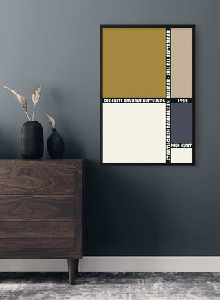 Bauhaus Weimar Braun 1922 Plakat poster with geometric color blocks, framed and hung on a modern wall.
