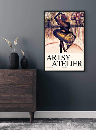 Framed Beautiful Dancer Atelier Plakat on a grey wall above a wooden cabinet with decorative vases.