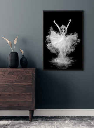 Powder Burst poster by Pauline Pentony featuring a dancer in white, displayed on a modern interior wall.