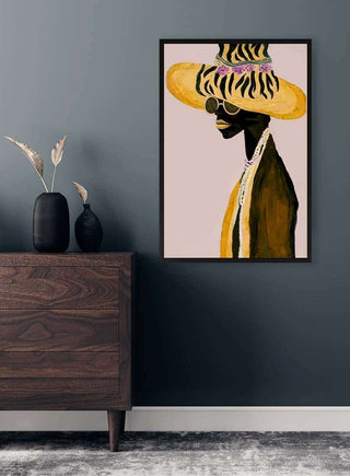 Framed "Angel Of Me" by David Wolf on a gray wall above a wooden dresser with decorative vases.