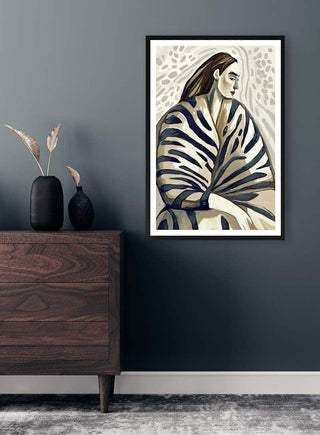 Framed "Altered Angel" by David Wolf displayed on a gray wall above a wooden dresser with decorative vases.