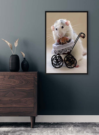 Framed photo of a cute rat holding a tiny teddy bear in a toy stroller, displayed above a dark wood dresser.
