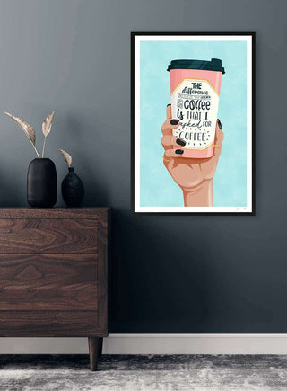 Framed art print of a hand holding a coffee cup with "Asked For Coffee - ByKammille" quote on wall above dresser.