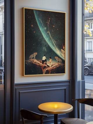 Framed "Guardians of Our Future" artwork by Frank Moth displayed on a wall in a stylish café setting.