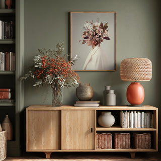 Framed "I Fell In Love With Fall Because of You" artwork by Frank Moth displayed above a stylish wooden console.