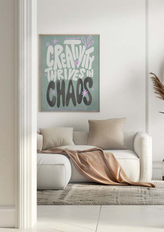 Creative Chaos - Baroo Bloom wall art above a white sofa in a modern living room setting.