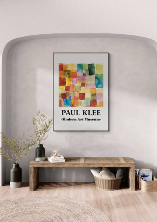 Framed "Untitled 1914" by Paul Klee displayed above a wooden bench in a modern, minimalist room.