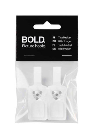 Package of two white plastic picture hooks for wall mounting, labeled "BOLD. Picture hooks."