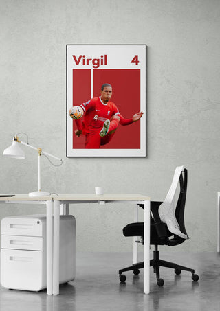 Virgil van Dijk football poster featuring him in action, displayed on an office wall above a desk and chair.