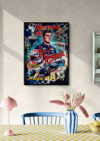 Poster of Max Verstappen with racing imagery displayed on a dining room wall above a table and chairs.