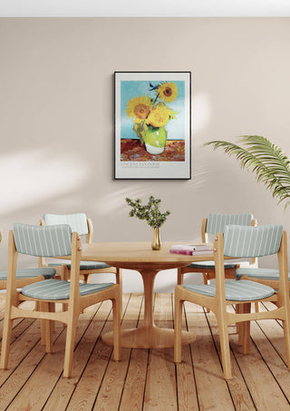 Framed "Vase With Flowers - Van Gogh" artwork displayed above a dining table with four chairs.