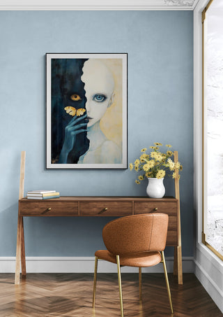 "My Secret Butterfly" by Martin Zen displayed above a modern wooden desk in a stylish, light blue interior.