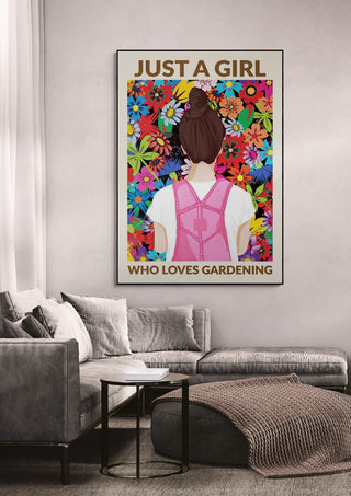 Poster of a girl in pink overalls facing colorful flowers, with the text "Just a Girl Who Loves Gardening."