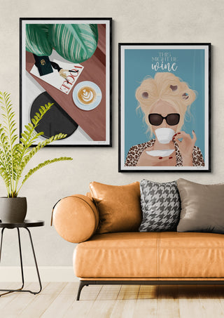 Stylish living room with Self Care - ByKammille art prints, cozy sofa, and decorative plant.