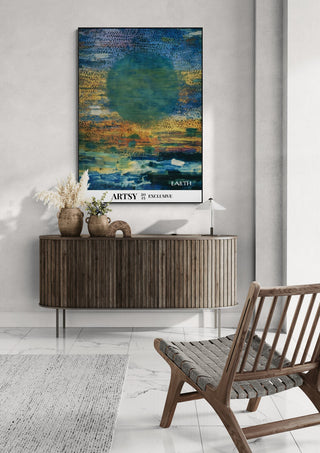 Abstract Earth painting by Martin Zen hangs above a wooden console in a modern living room setting.