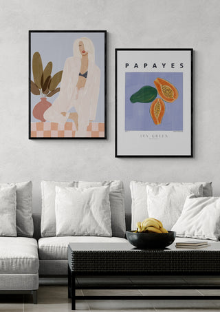 Framed Papayes - Ivy Green art print hangs above a modern sofa in a stylish living room setting.