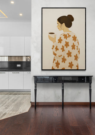 Framed Good Morning by Annika Persson featuring a woman with a cup, displayed above a black console table.